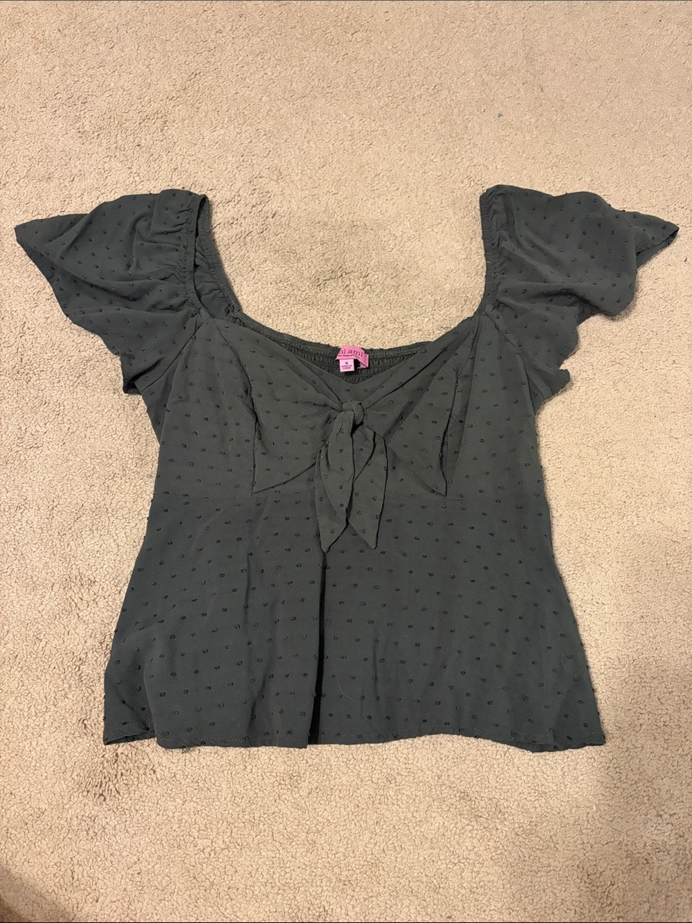 Green polka dot textured flutter sleeve top